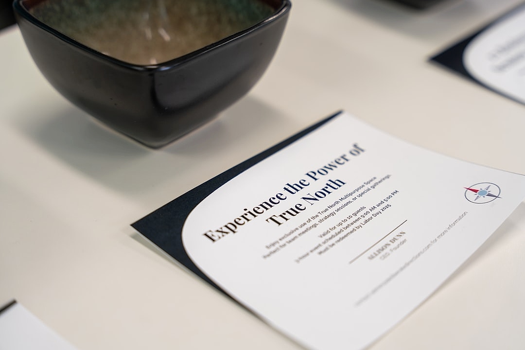 Team workshop session with financial charts